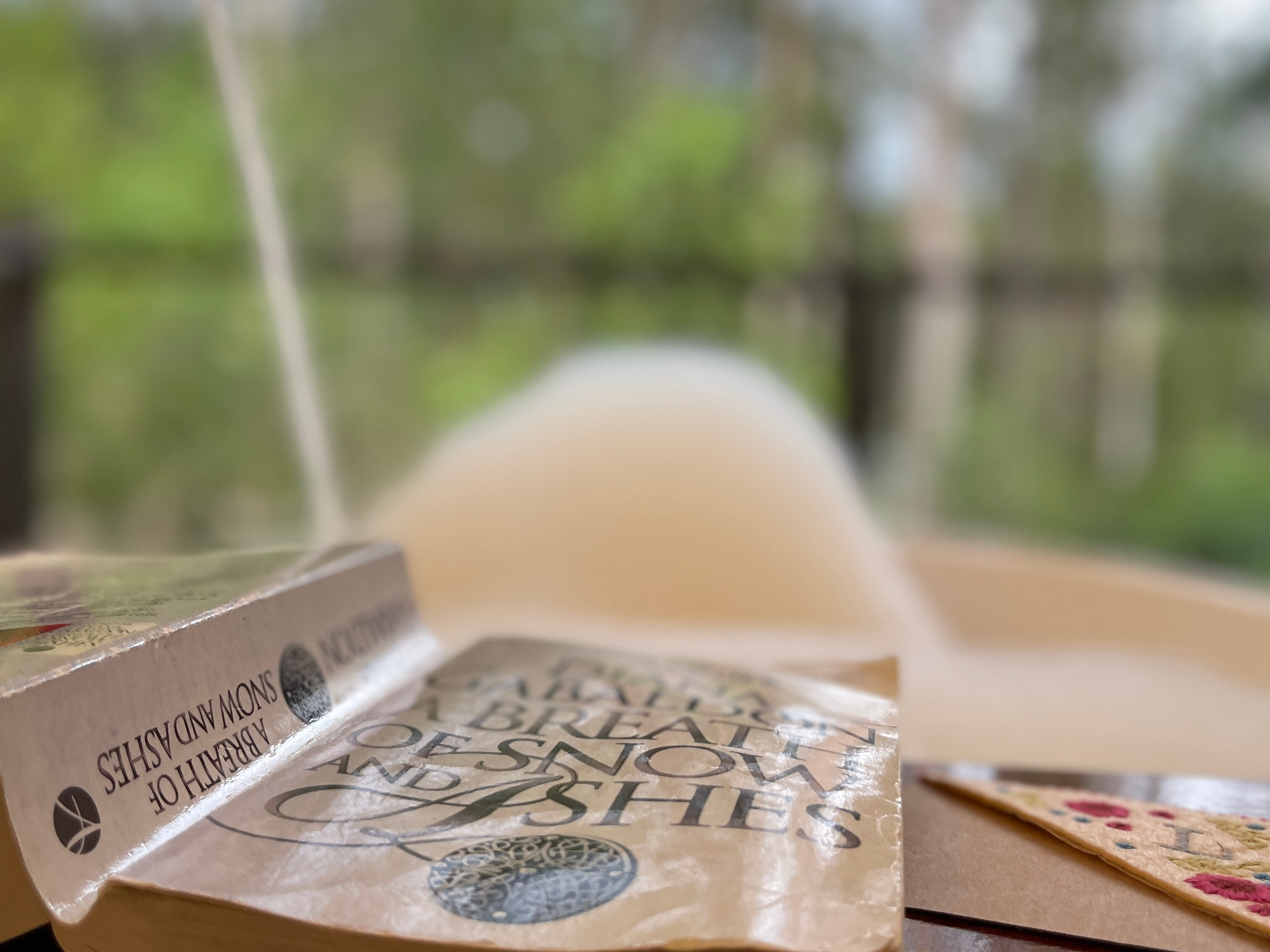A photo of a book I was reading in an outdoor bathtub in a remote cabin in the Hunter Valley